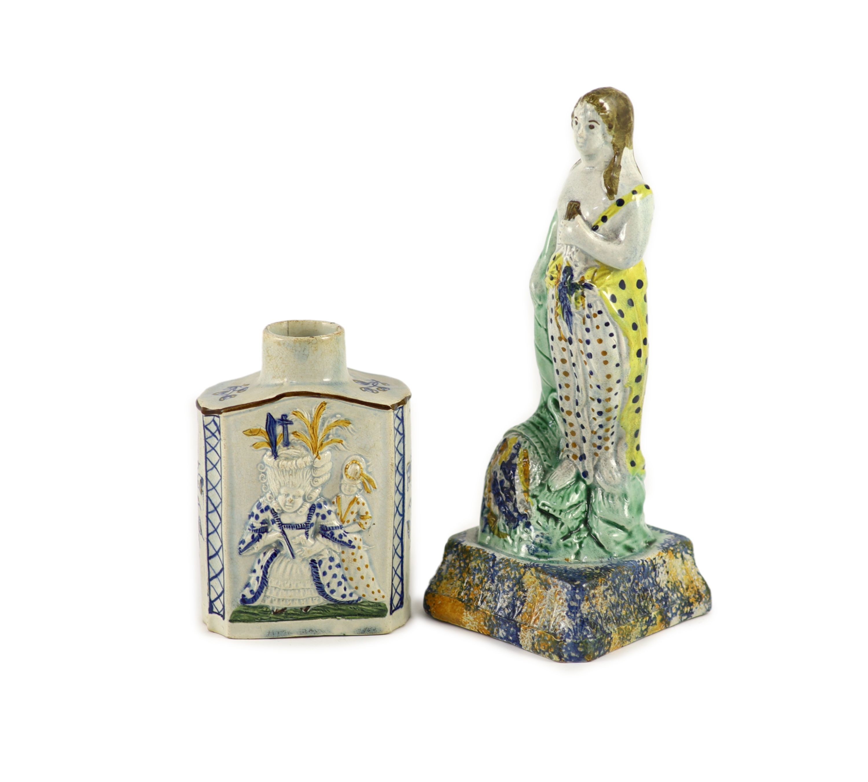 A Staffordshire Prattware pearlware tea caddy and figure of Flora, c.1790, 12.5 and 22cm high